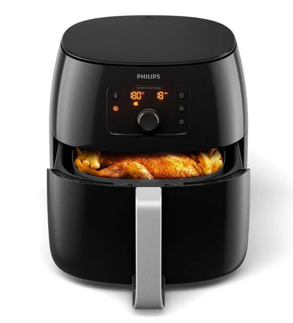 Philips Premium Airfryer XXL HD9651/91 with delicious fries, frying food with up to 90% less fat and crispy flavor.